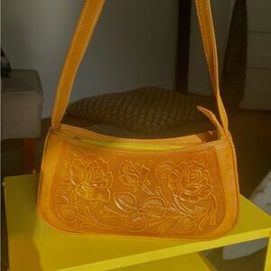 Tan leather floral embossed shoulder bag